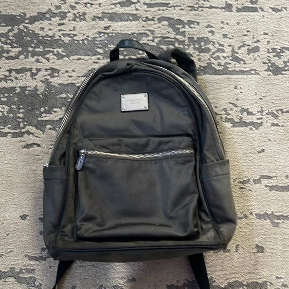 Michael Kors backpack purse good condition all zippers work